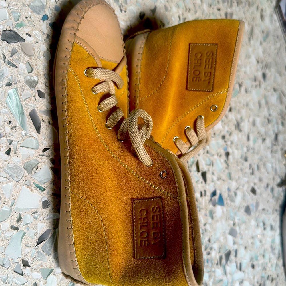 Never worn SEE BY CHLOE suede gold high tops!